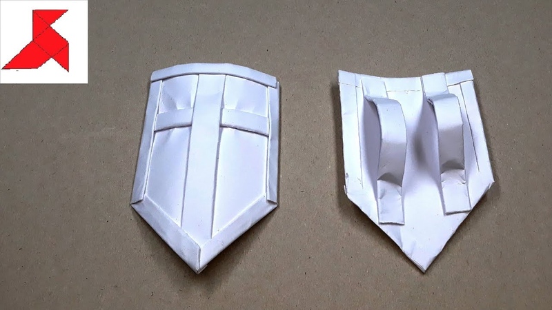 Щит из картона для ребенка. Как сделать щит из картона. Щит рыцаря из картона. Меч из картона. Щит и меч из картона.